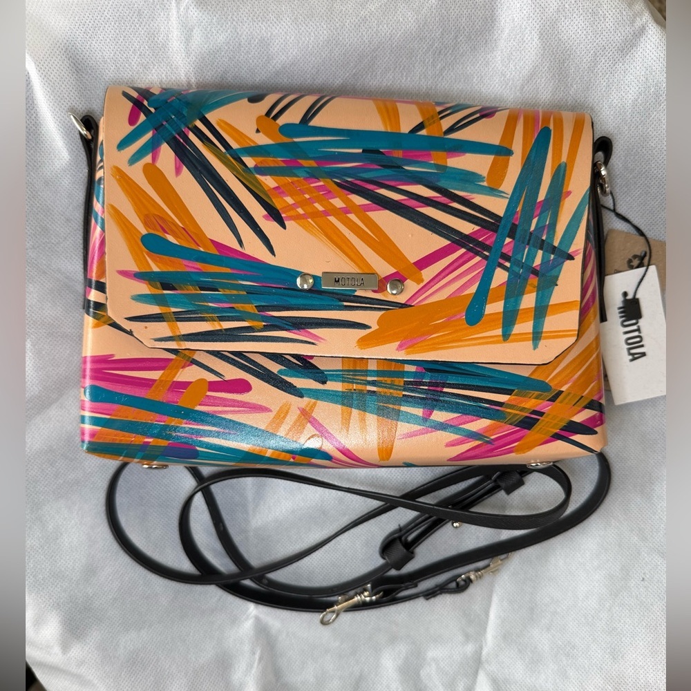 Hand painted crossbody
Recycled leather